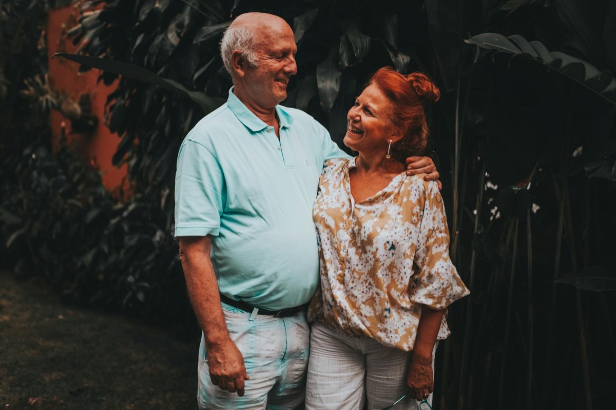 A couple smiling at each other