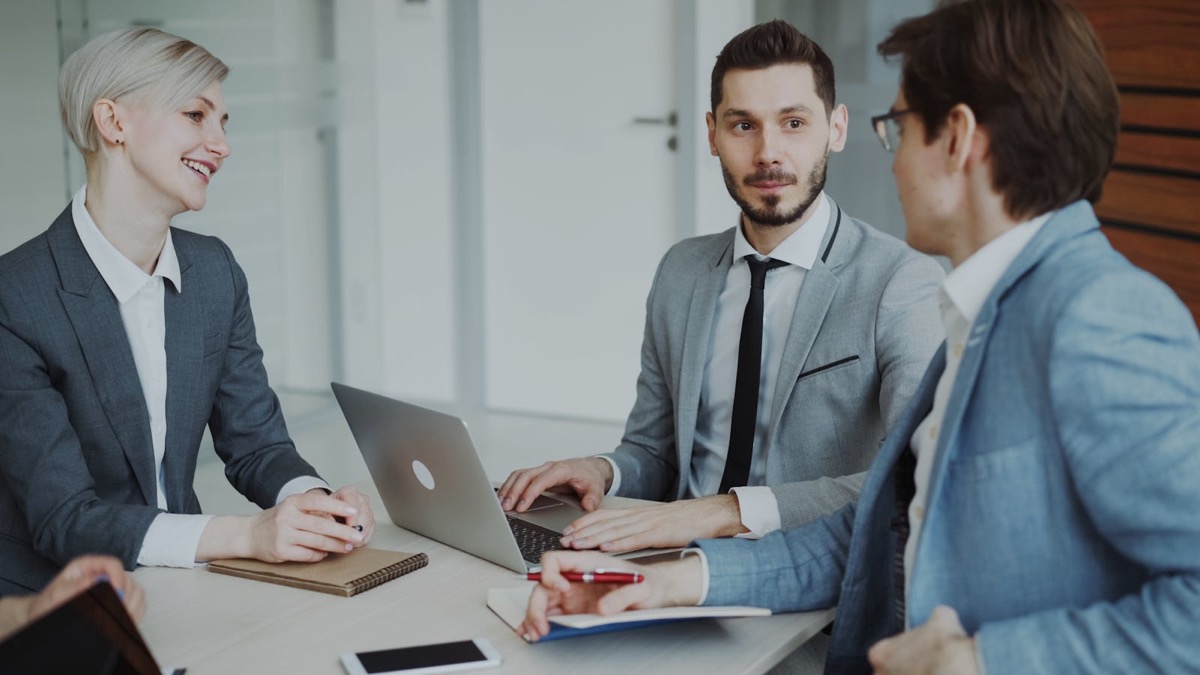 An Australian employer meeting with a sponsored professional