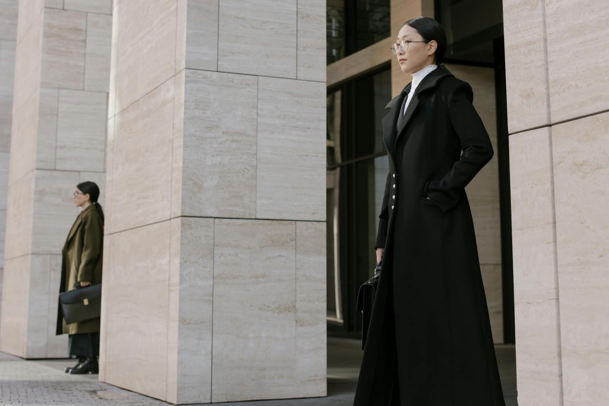 Two skilled professionals outside a city office in Australia