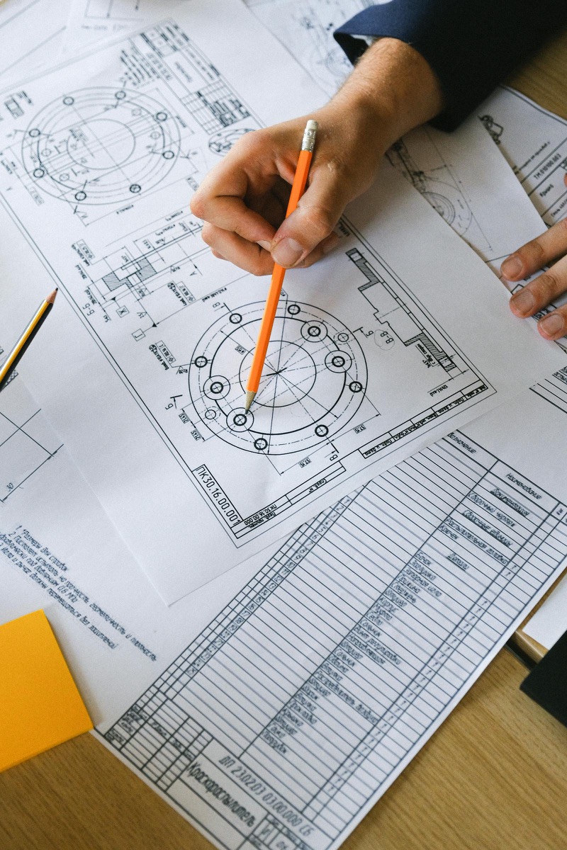 A specialist reviewing technical work in Australia