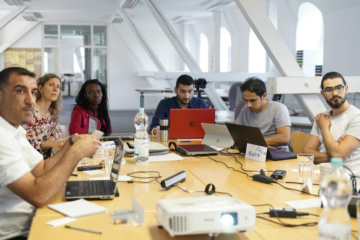 Specialists in a focused workplace meeting